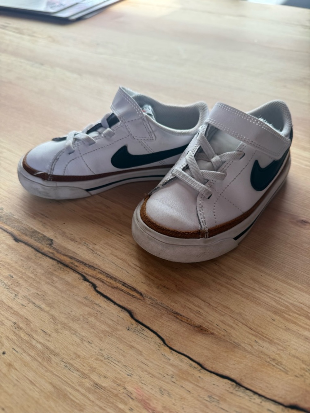 Nike Kids White Sneakers with Teal Swoosh and Brown Trim